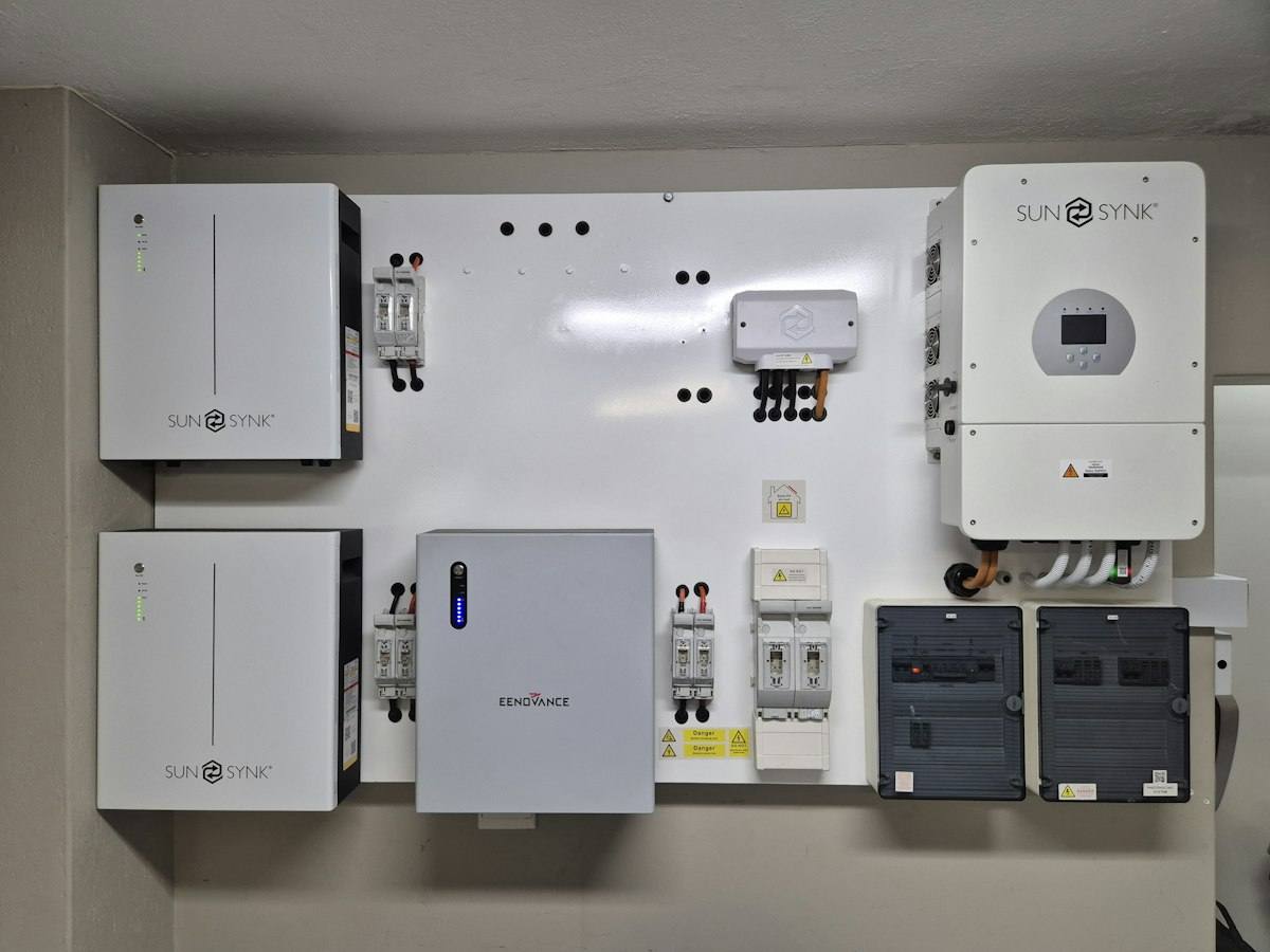 Home solar battery storage unit installed on a wall